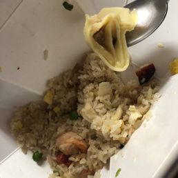 Yang Zhou fried rice and wonton soup on the side. That's just a half cut piece of wonton on my spoon. Yang Zhou fried rice and wonton soup on the side. That's just a half cut piece of wonton on my spoon.