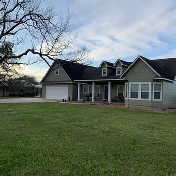 Houston Painters Pro - Residential Exterior Painting in Angleton, TX. The process includes cleaning, repairing, protecting, and painting. - Painters Near Me