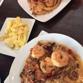 Teavolve - Shrimp and grits up front, side of scrambled eggs to the left, and funnel cake French toast in the back. - Coffee & Tea Near Me - Baltimore, Maryland