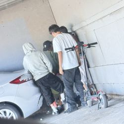 Mediterranean Apartments - Kids doing drugs & nozz in parking lot