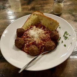 Spaghetti bolognese with meatballs and extra sauce.