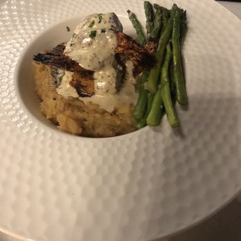 The Lions Den 1837 - Surf and turf with steak medallions and blackened shrimp with hollandaise sauce - Steakhouses Near Me - Mineral, Virginia