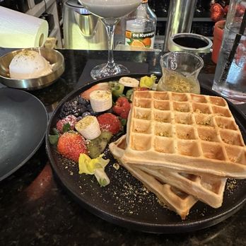 Rosalia's Kitchen - Pistachio martini, emerald waffles with the ice cream on the side. - Italian Near Me - Miramar, Florida Rosalia's Kitchen - Pistachio martini, emerald waffles with the ice cream on the side. - Italian Near Me - Miramar, Florida