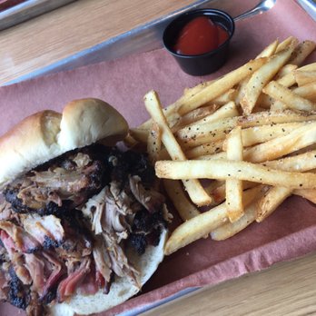 Doc's Commerce Smokehouse - Pulled pork sandwich and seasoned fries...YUM! - Barbeque Near Me - Milwaukee, Wisconsin Doc's Commerce Smokehouse - Pulled pork sandwich and seasoned fries...YUM! - Barbeque Near Me - Milwaukee, Wisconsin