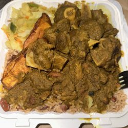 Culcha Juice Bar Lounge - Curry Goat with cabbage and plantains.