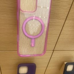 Phone case display where you can tru the case and then open the drawer to grab one to buy.