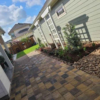 Knight's Precision Cuts - a brick walkway in a backyard - Masonry/Concrete Near Me - Lafayette, Louisiana Knight's Precision Cuts - a brick walkway in a backyard - Masonry/Concrete Near Me - Lafayette, Louisiana