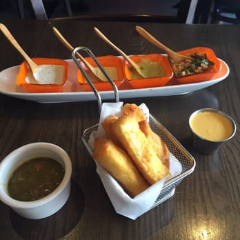 Pollos & Jarras - Yucca sticks with dipping sauce - Peruvian Near Me - Miami, Florida Pollos & Jarras - Yucca sticks with dipping sauce - Peruvian Near Me - Miami, Florida