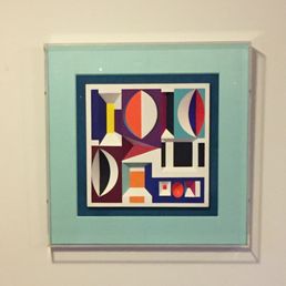 Agam with double mat in acrylic box.