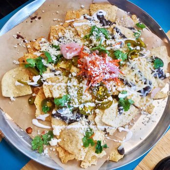 Pinthouse Pizza - House Nachos (new recipe) with not enough cheese and too much hipster - Pizza Near Me - Austin, Texas Pinthouse Pizza - House Nachos (new recipe) with not enough cheese and too much hipster - Pizza Near Me - Austin, Texas