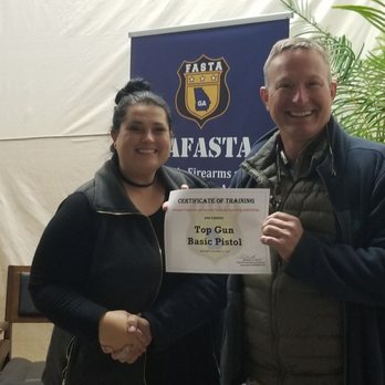 Georgia Firearms And Security Training Academy - Veronica getting top shooter award - Gun/Rifle Ranges Near Me - Flowery Branch, Georgia