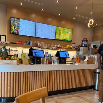 Real Fruit Bubble Tea - a man standing at a counter - Bubble Tea Near Me - Hackensack, New Jersey
