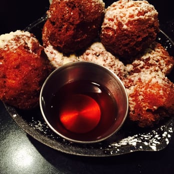 Palomino Bar - Sweet Potato Doughnut Holes with Spicy Maple Syrup. Get this appetizers, it is delicious. - Southern Near Me - Milwaukee, Wisconsin Palomino Bar - Sweet Potato Doughnut Holes with Spicy Maple Syrup. Get this appetizers, it is delicious. - Southern Near Me - Milwaukee, Wisconsin