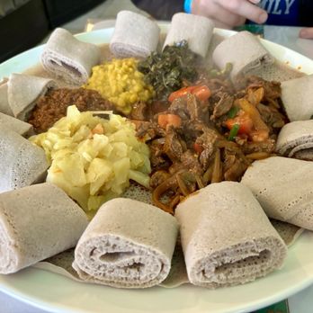 Elilta Restaurant - 4 veggie option with Beef entree. Absolutely amazing. First time here and would recommend it over and over again - Eritrean Near Me - Silver Spring, Maryland