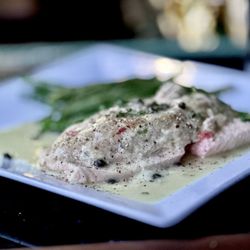 The Dublin Yard - Crab -Stuffed Salmon BROILED SALMON STUFFED WITH CRAB MEAT IN A LEMON CAPER SAUCE SERVED WITH A SIDE SAUTEED GREEN BEANS.