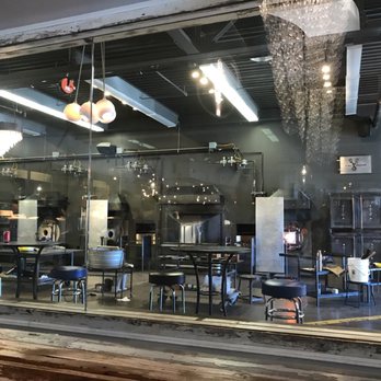 M Italian - View of the glass blowing studio from our table - Diners Near Me - Chagrin Falls, Ohio M Italian - View of the glass blowing studio from our table - Diners Near Me - Chagrin Falls, Ohio