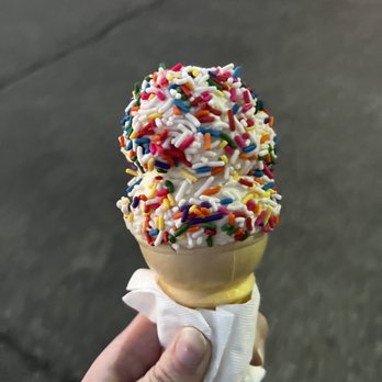 Brr-Kee's Ice Cream - a hand holding an ice cream cone with sprinkles - Ice Cream & Frozen Yogurt Near Me - Oakmont, Pennsylvania Brr-Kee's Ice Cream - a hand holding an ice cream cone with sprinkles - Ice Cream & Frozen Yogurt Near Me - Oakmont, Pennsylvania