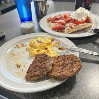Omelette & Waffle Shop - Strawberry waffle with some sides - Breakfast & Brunch Near Me - San Pedro, California Omelette & Waffle Shop - Strawberry waffle with some sides - Breakfast & Brunch Near Me - San Pedro, California