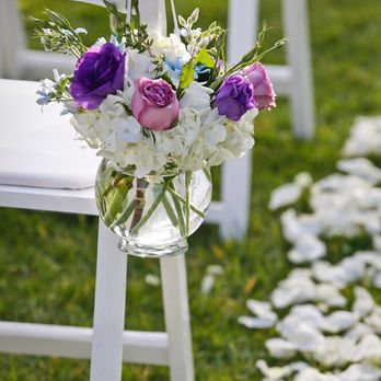 Fleurish - These arrangements lined the aisles and then were repurposed to the cocktail tables! - Florists Near Me