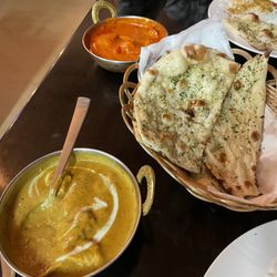 Curry Palace - Chicken korma, garlic naan, and butter chicken