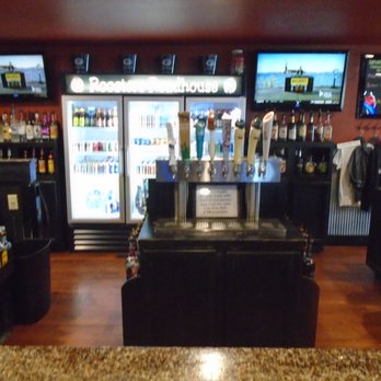 Roosters Roadhouse - Back of the bar. - Bars Near Me - New Richmond, Wisconsin Roosters Roadhouse - Back of the bar. - Bars Near Me - New Richmond, Wisconsin