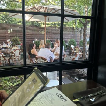 BLVD Kitchen & Bar - Patio view from inside - American Near Me - Minnetonka, Minnesota BLVD Kitchen & Bar - Patio view from inside - American Near Me - Minnetonka, Minnesota
