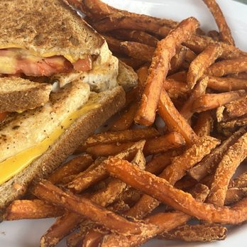Gilbert's Tiki Bar - Fish sandwich mahi sweet potato fries - Tiki Bars Near Me - Key Largo, Florida Gilbert's Tiki Bar - Fish sandwich mahi sweet potato fries - Tiki Bars Near Me - Key Largo, Florida