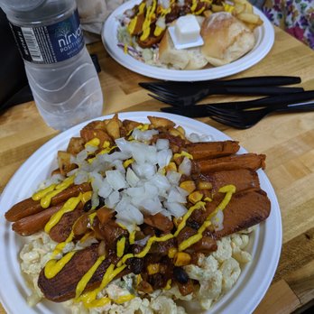 Dogtown - veggie dog plate with mac salad, home fries, and everything on it. (half veggie dog plate with cole slaw and fries in the background). - American Near Me - Rochester, New York Dogtown - veggie dog plate with mac salad, home fries, and everything on it. (half veggie dog plate with cole slaw and fries in the background). - American Near Me - Rochester, New York