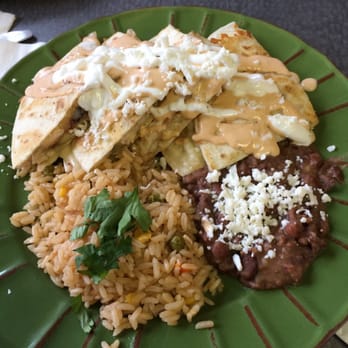 Raizes Mexican Kitchen - Chipotle Chicken Quesadillas with rice and beans - Mexican Near Me - Stafford, Texas Raizes Mexican Kitchen - Chipotle Chicken Quesadillas with rice and beans - Mexican Near Me - Stafford, Texas