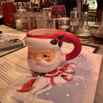 Cowan's Public - The cutest Santa mug and drink menu. Hot toddy drink inside. - Cocktail Bars Near Me - Nutley, New Jersey