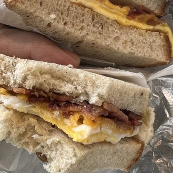 NY Bagels & Cafe - Ordered Build Your Breakfast: Sourdough Bread (They used Incorrect bread, maybe Rye, as seen in photo), Bacon, 1 Egg, Cheddar Cheese - Bagels Near Me - New York, New York NY Bagels & Cafe - Ordered Build Your Breakfast: Sourdough Bread (They used Incorrect bread, maybe Rye, as seen in photo), Bacon, 1 Egg, Cheddar Cheese - Bagels Near Me - New York, New York
