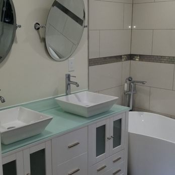 Stone Style Design - Designer double vanity with glass top and soak in tub - Kitchen & Bath Near Me - Fairfax, Virginia