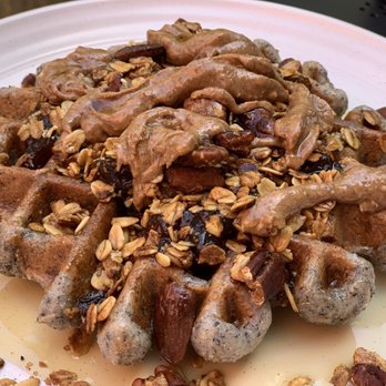 The Hidden Kitchen - Chorro Crunch Blue Corn Waffle -- Organic Almond Butter -- Homemade Almond Pecan Granola -- Organic Fig Jam -- Organic Maple Syrup (gf) - Juice Bars & Smoothies Near Me - Cambria, California The Hidden Kitchen - Chorro Crunch Blue Corn Waffle -- Organic Almond Butter -- Homemade Almond Pecan Granola -- Organic Fig Jam -- Organic Maple Syrup (gf) - Juice Bars & Smoothies Near Me - Cambria, California