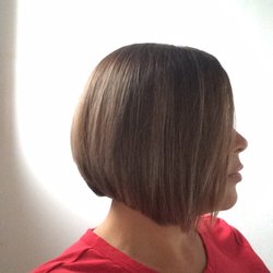 Salon Four - Beautiful color & cut by Kelly. Toned down my brassiness & dyed my roots to cover my grays.