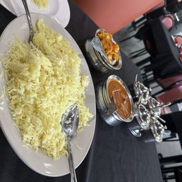 Rice and butter chicken. And aloo gobi