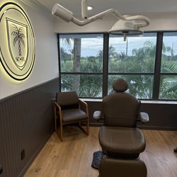 Skin Center Of Florida - Exam room with view of the North Palm Beach Country Club