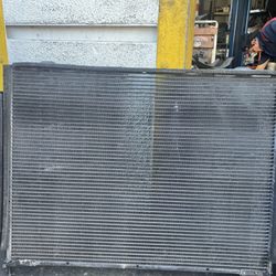 Tashmo Auto Center - AC condenser. The dark black areas are where it was leaking Freon from.