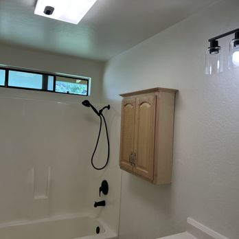 Kirt Bell - Looks like a new bathroom with holes repaired, new paint and fixtures, helping the original shower over tub, cabinet and vanity look ok! - Tiling Near Me - Pollock Pines, California Kirt Bell - Looks like a new bathroom with holes repaired, new paint and fixtures, helping the original shower over tub, cabinet and vanity look ok! - Tiling Near Me - Pollock Pines, California