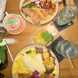 The Omelet Spring Steak & garlic parmesan potatoes, a Mango Sunset drink, cappuccino, & the Chicken Royale. The Omelet Spring Steak & garlic parmesan potatoes, a Mango Sunset drink, cappuccino, & the Chicken Royale.