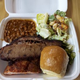 The Two Meat Combo with two sides and a bun - eat the beans! Brisket and Ribs The Two Meat Combo with two sides and a bun - eat the beans! Brisket and Ribs