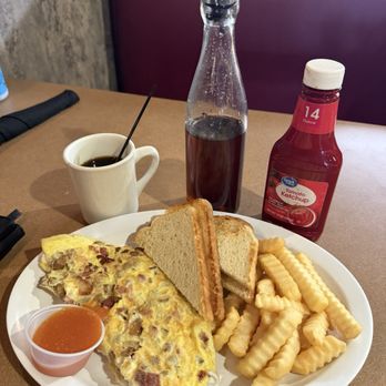 Monroe's Kitchen - Meat lovers  omelette with a cup of black coffee - Breakfast & Brunch Near Me - Buckeye, Arizona