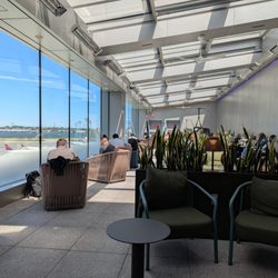 Delta Air Lines - Delta Sky Club at LaGuardia Airport (LGA) Terminal C. Outside on the patio.
