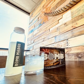 Bomb Burritos & Bowls - a bottle of bomb burritos and a box of bomb burritos - Fast Food Near Me - Westerly, Rhode Island Bomb Burritos & Bowls - a bottle of bomb burritos and a box of bomb burritos - Fast Food Near Me - Westerly, Rhode Island
