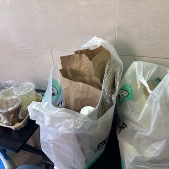 Banh Mi TBD - Sorry I ain't opening it til I get home but there's 6 classics and 1 crispy pork Banh Mi and spring rolls and drinks!!! - Vietnamese Near Me - Flushing, New York