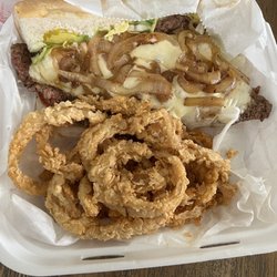 Tee Wayne's - Ribeye po boy and onion rings
