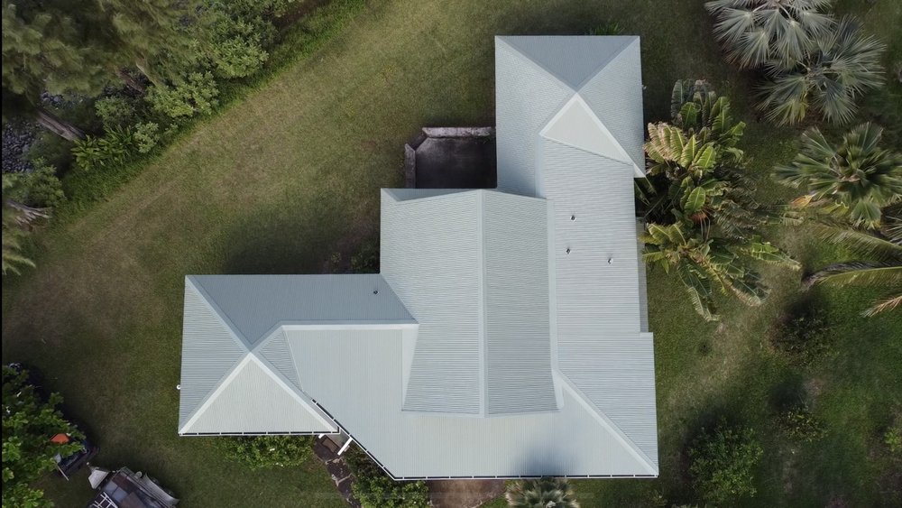 Slide of Metal Roof Pros-Kaua'i Roof Installers