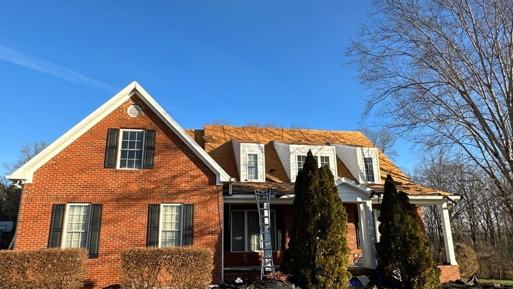 Slide of Aultman Roofing