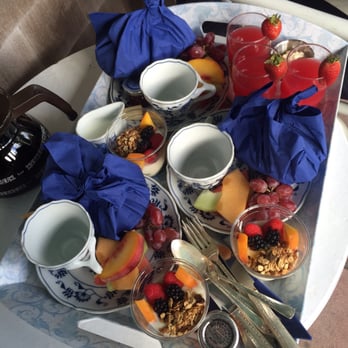The Barnacle Inn - Breakfast at Barnacle! Inside the blue napkins are fresh handmade muffins and biscuits! - Bed & Breakfast Near Me - Nantucket, Massachusetts