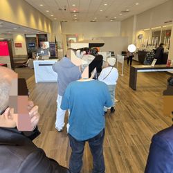 Bank of America Financial Center - A BofA line out the door at 1:45 pm in the afternoon, there are only two tellers, and one is focused on Business Clients.