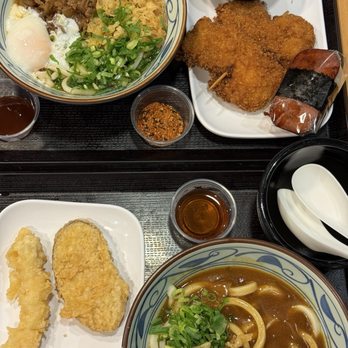 Marugame Udon - Curry udon, Nikutama udon, chicken katsu, spam musubi, shrimp tempura, sweet potato tempura, and egg tempura. 10/10!! - Japanese Near Me - Honolulu, Hawaii Marugame Udon - Curry udon, Nikutama udon, chicken katsu, spam musubi, shrimp tempura, sweet potato tempura, and egg tempura. 10/10!! - Japanese Near Me - Honolulu, Hawaii